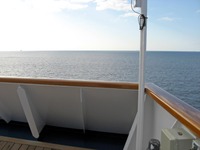 Other vessels in the distance on the Atlantic Ocean, seen from the Deck 11 starboard forward lookout above the bridge on Carnival Sensation.