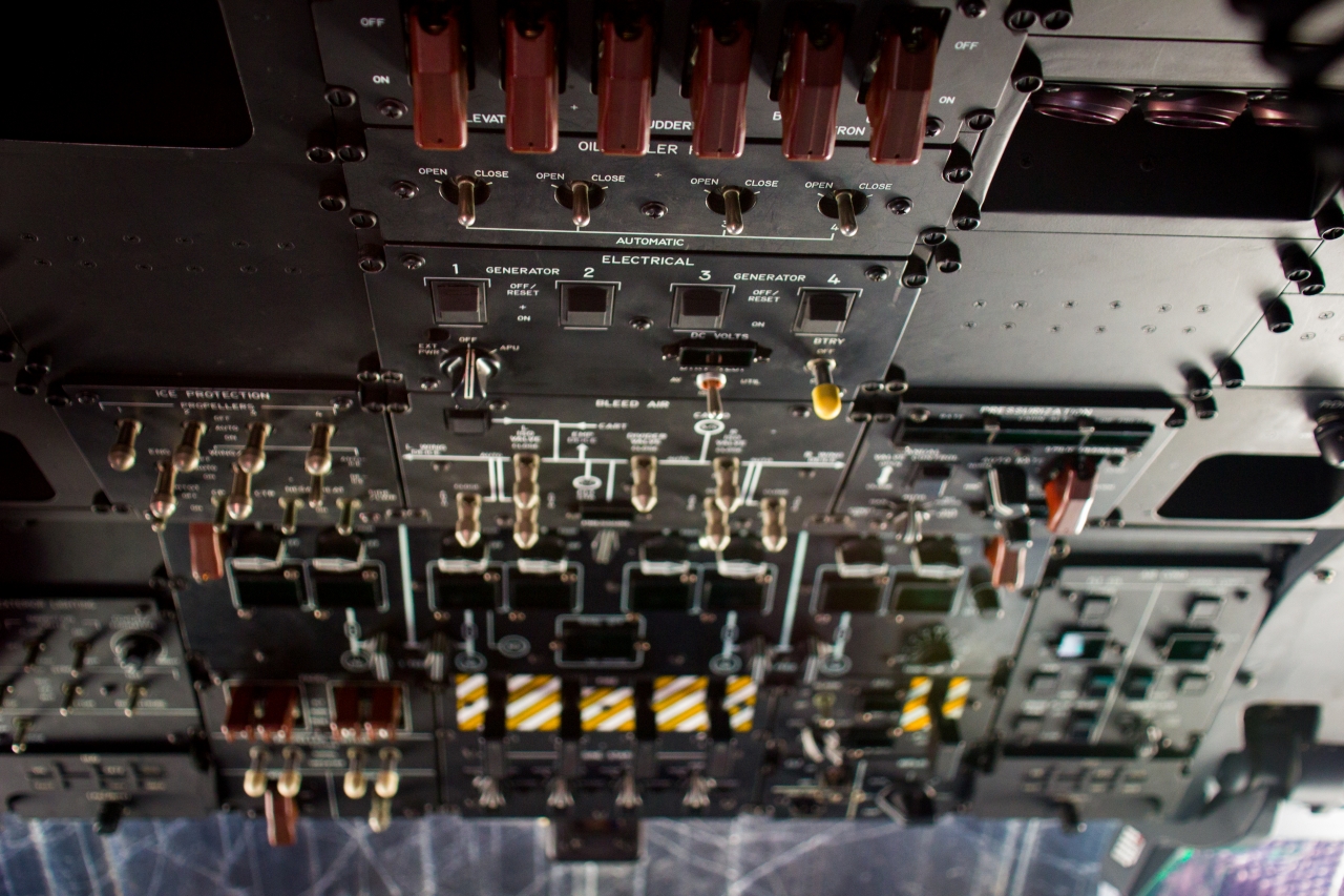 Control boost, oil cooler flaps, electrical generators, fire suppression system and other controls on the cockpit overhead panel aboard United States Air Force Reserve 403d Wing 53d Weather Reconnaissance Squadron 'Hurricane Hunters' WC-130J Hercules 75304.