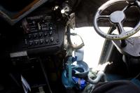 Oxygen regulator and radio controls, oxygen mask, lower window and tiller wheel from the captain's seat in the cockpit aboard United States Air Force Reserve 403d Wing 53d Weather Reconnaissance Squadron 'Hurricane Hunters' WC-130J Hercules 75304.
