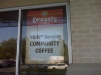'NOW' Serving COMMUNITY COFFEE