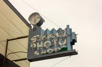 The neon sign for Stewart's Photo Shop at the Ship Creek Meat Market building (1936) in downtown Anchorage.