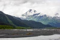 Forests and mountains in the valley along the braided Resurrection River not far from Exit Glacier.