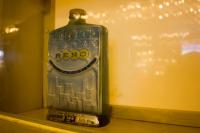 "Reno 100 Years" Jim Beam whiskey decanter (1968) by C. Miller/Regal China on display inside Thorn's Showcase Lounge.