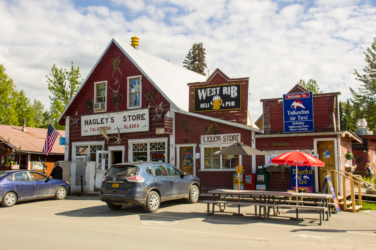 Storefronts for Nagley's Store, home of Stubbs the Cat (1997–2017), West Rib Pub and Grill and Talkeetna Air Taxi.