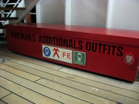 'Firemans Additionals Outfits' red safety equipment box along the Deck 11 starboard exterior corridor on Carnival Sensation.