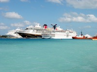 Carnival Destiny IMO 9070058, Disney Dream IMO 9434254, Carnival Sensation and tugboats Suhaili IMO 7626592 and Bluster IMO 8516976 docked at Prince George Wharf, Port of Nassau.