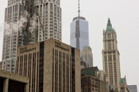 1 Pace Plaza (1969), 8 Spruce Street (2011), Woolworth Building (1913) and One World Trade Center (2014) from near the end of the Brooklyn Bridge (1883) pedestrian and cyclist promenade.