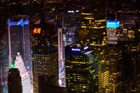 Northern view including 1095 Avenue of the Americas (1974), the Condé Nast Building (1999) and One Astor Plaza (1972) in Times Square from the 86F observation deck of the Empire State Building (1931).