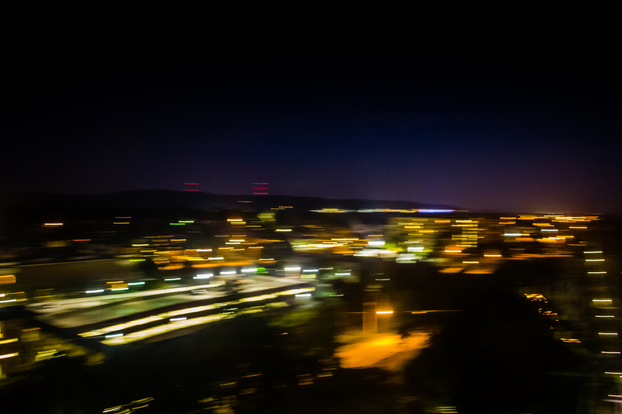 The lights of antenna towers off Sand Hill Road, downtown parking garage at the Hershey Story building and street lamps of Park Boulevard as seen from the 250-foot Kissing Tower (1975) at Hersheypark.