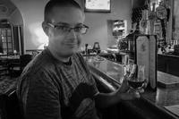 David July enjoying a glass of The Glenlivet single malt Scotch whisky at the Iberian Lounge bar inside The Hotel Hershey (1932) in Hershey, Pennsylvania.