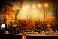 Mural of a Spanish waterfront scene by Robert von Ezdorf behind the bar inside the Iberian Lounge at The Hotel Hershey (1932) in Hershey, Pennsylvania.
