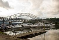 Boats moored to Dock A at Smitty's Marina and the Belle Vernon Bridge (1951) over the Monongahela River from the Pennsylvania Fish and Boat Commission Speers Landing access on River Avenue in Speers, Pennsylvania.