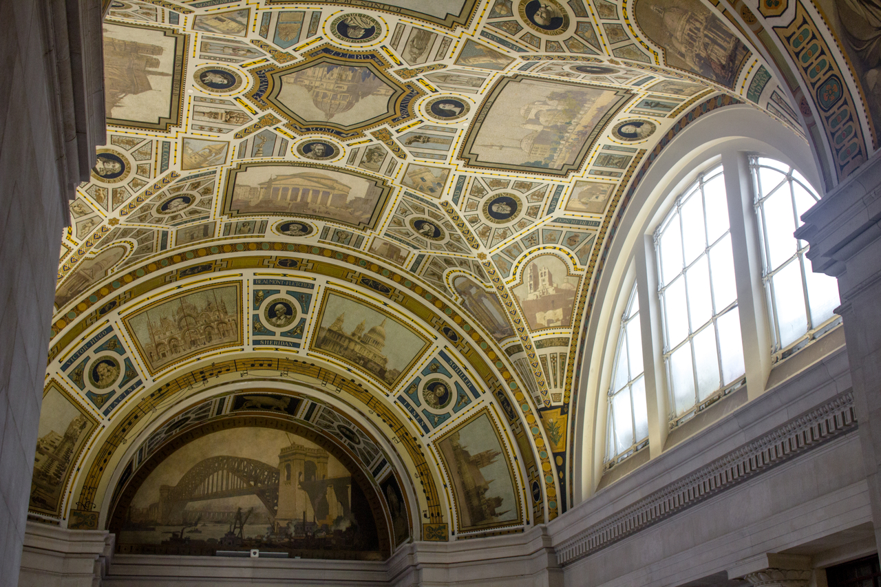 Frescos of notable buildings and artists from history painted on the ceiling of the main foyer outside Kresge Theatre in the College of Fine Arts Building (1916) at Carnegie Mellon University.