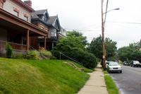 The house at 355 South Atlantic Avenue and the old style single family home at 359 South Atlantic Avenue (1913) in the Friendship neighborhood of Pittsburgh, Pennsylvania.