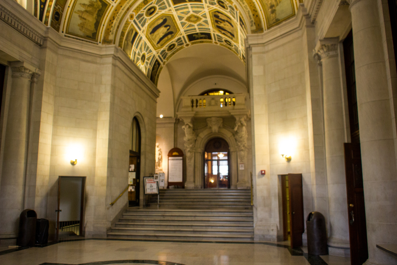 The main foyer and stairway outside Kresge Theatre in the College of Fine Arts Building (1916) at Carnegie Mellon University.
