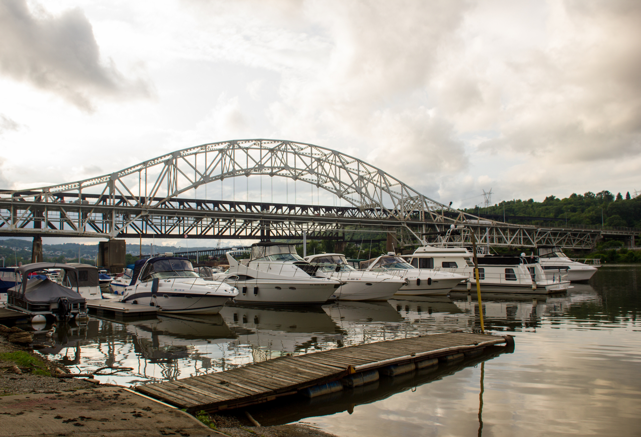 Boats moored to Dock A at Smitty's Marina and the Belle Vernon Bridge (1951) over the Monongahela River from the Pennsylvania Fish and Boat Commission Speers Landing access on River Avenue in Speers, Pennsylvania.