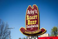 An original Arby's Restaurant ten-gallon cowboy hat sign (1973) with neon and light bulbs at Store 619 in Meadville, Pennsylvania.