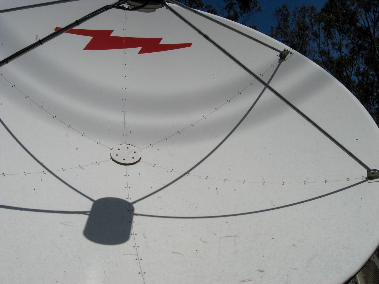 An Andrew Corporation dish installed under Sutro Tower.