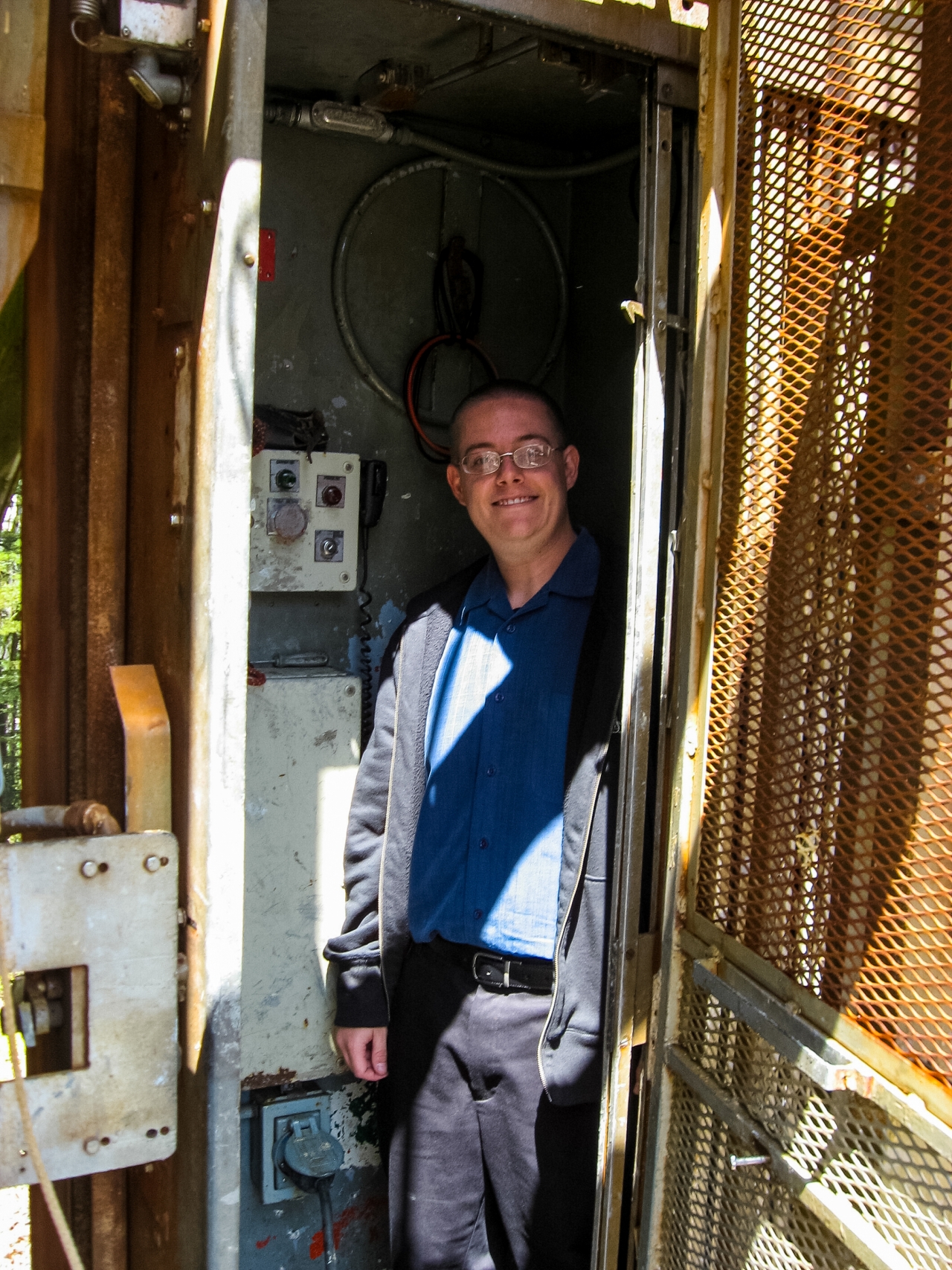 David July inside the Sutro Tower elevator located in the western leg.