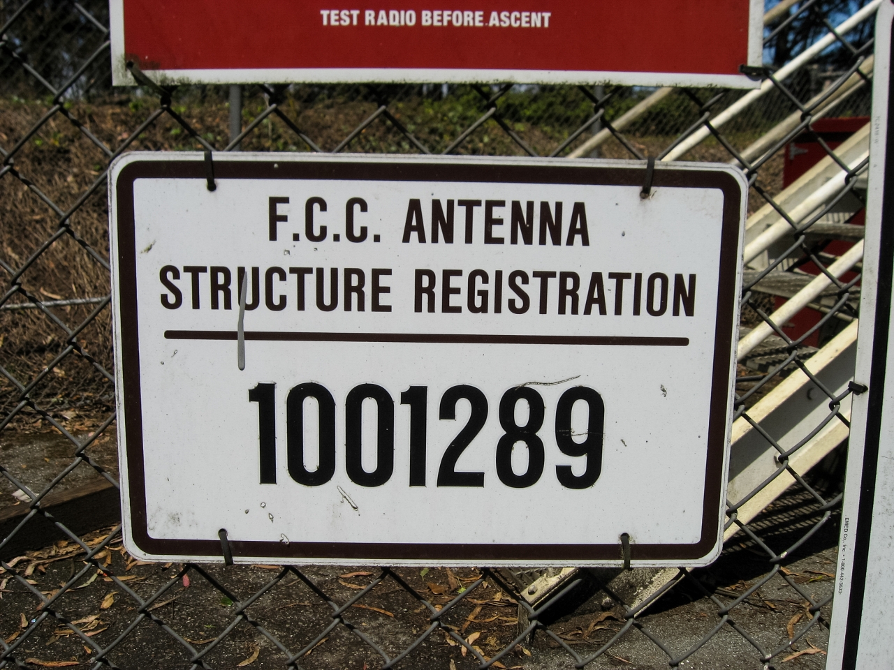 FCC ASR 1001289 sign just outside the Sutro Tower western leg and elevator.