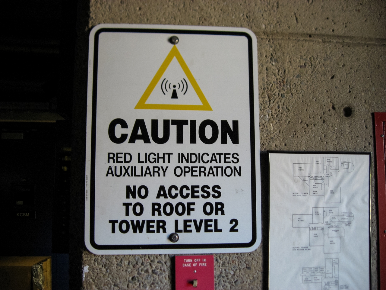Auxiliary operation warning sign in the Sutro Tower building.