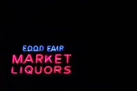 The neon sign for 'Food Fair Market Liquors' near the Stockton Street Tunnel (1914).