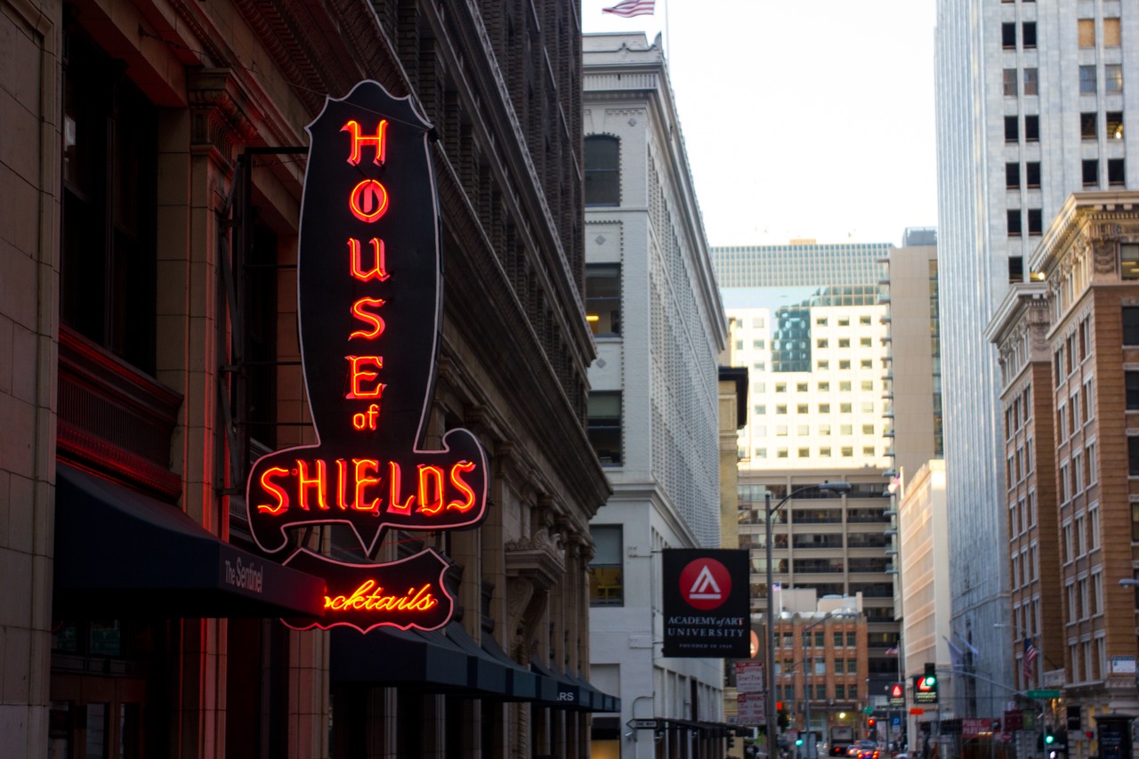 The red neon sign of The House of Shields saloon and the view of New Montgomery Street looking southeast.