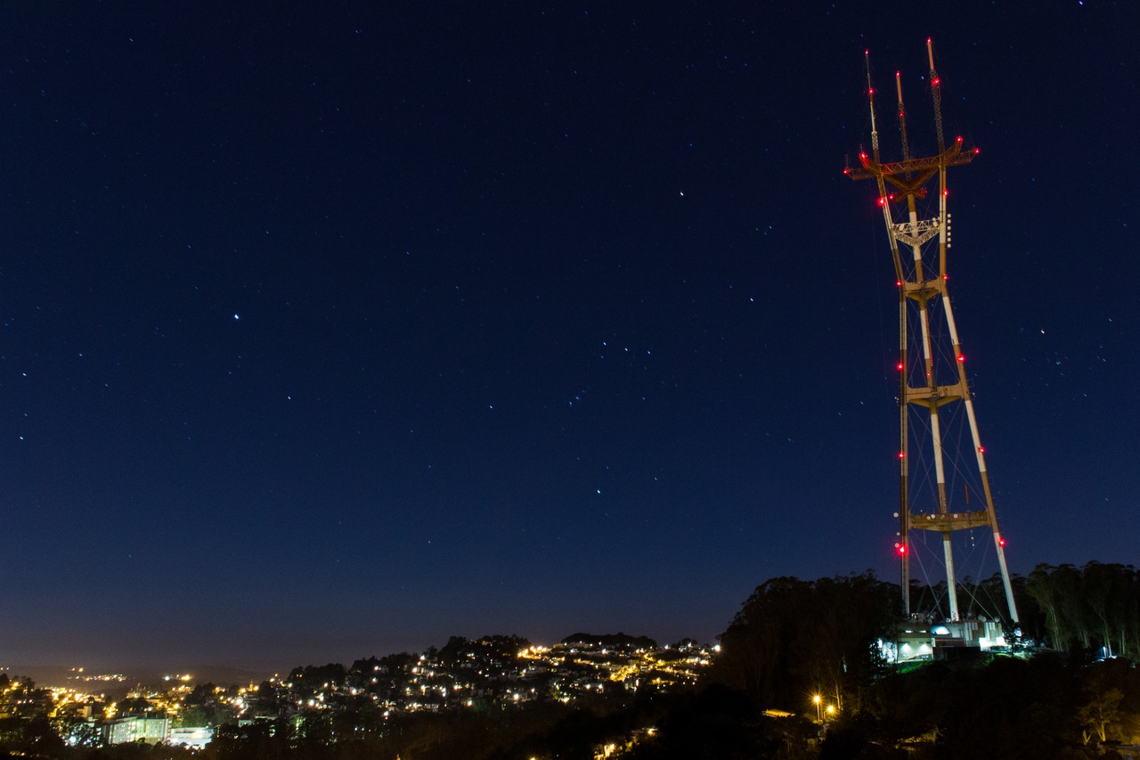 Thirty-second exposure from Twin Peaks of Sutro Tower (1972), the sky and lights from the western neighborhoods beyond.