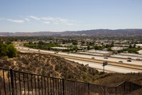 Looking southeast over Simi Valley from the water tank driveway gate in the far end of the parking lot of 400 National Way (1984), the fictional PlayTronics headquarters building in 'Sneakers' (1992).