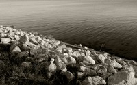 Rocks along the shore of Choctawhatchee Bay at Choctaw Beach next to Walton County Fire Rescue Station 10.