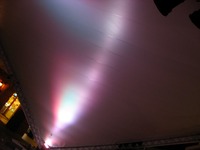 White light illuminating the covering over the stage at HarborWalk Village (7 of 7).