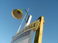 Slip sign and lamp along the HarborWalk Marina dock next to The Lucky Snapper Grill & Bar.