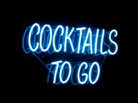 'Cocktails To Go' neon sign at Jester Daiquiris at HarborWalk Village.