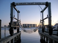 Galati Yacht Sales Marine Travelift boat hoist at HarborWalk Marina.