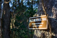 Sign for Bill's Memorial Trail 'designed and maintained by a loving daughter' between the western and eastern sections of Lafayette Heritage Trail Park.
