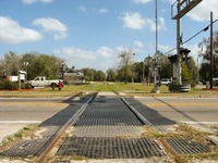 The old Savannah, Florida and Western Railroad tracks (1884) running southeast through High Springs at Main Street.