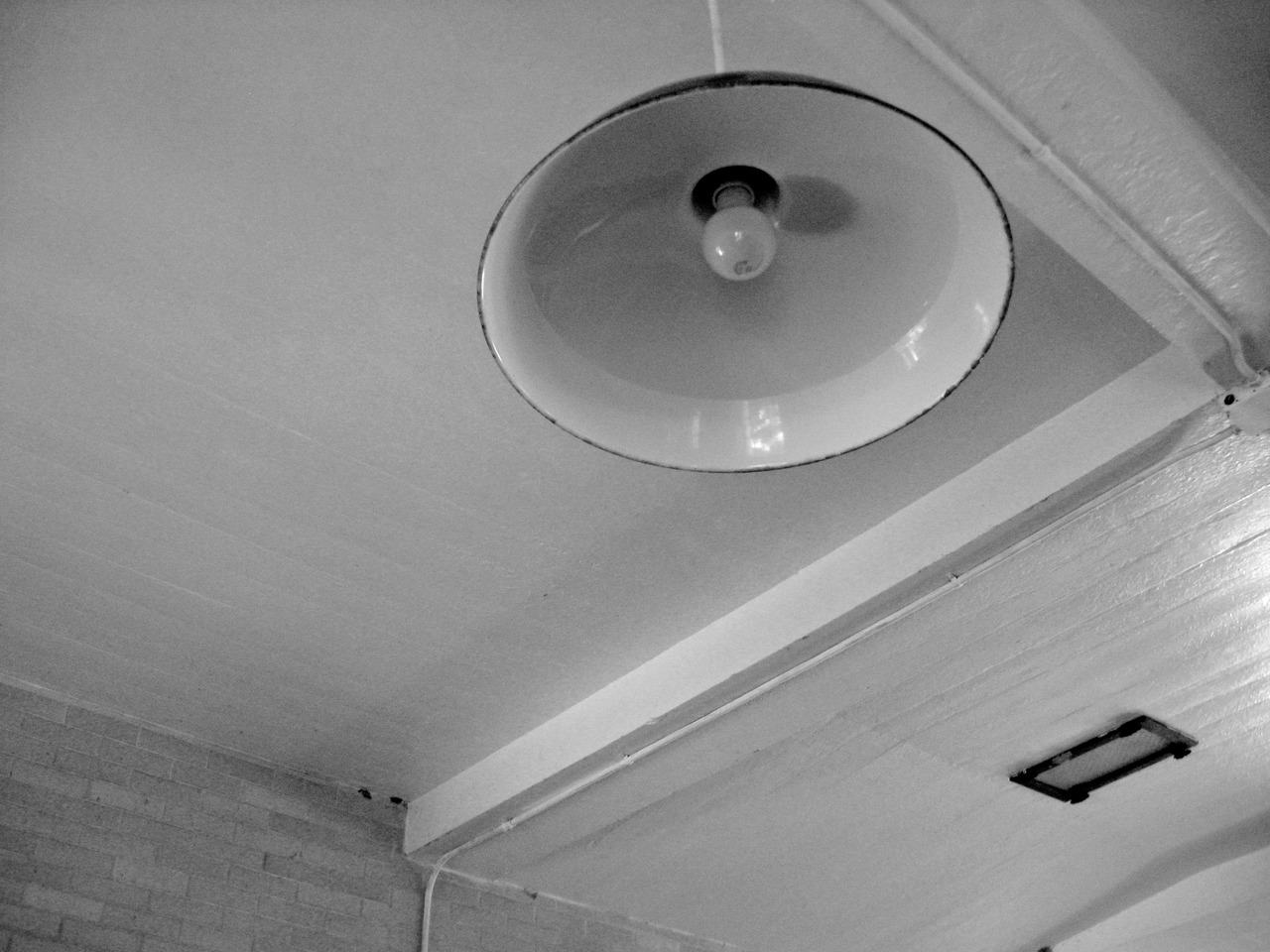 Lamp inside the Stable Complex (1928) cow barn at Pebble Hill Plantation.