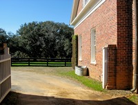 Outside the Stable Complex (1928) Carriage Room at Pebble Hill Plantation.