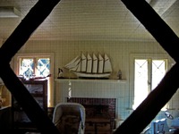Looking inside the playroom of the Log Cabin School (1901) at Pebble Hill Plantation.