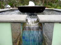 Fountain at the beginning of the 340 foot long runnel canal parallel to the walking path in Cerulean Park.