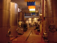 A row of tanks inside the Lakeridge Winery.
