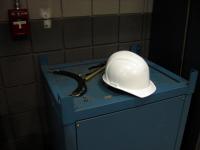 Hard hat on a blue cabinet in the DC Field wing corridor.
