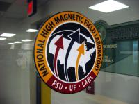 National High Magnetic Field Laboratory seal on glass.