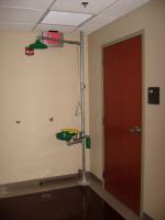 Emergency shower and eye wash in the corridor.