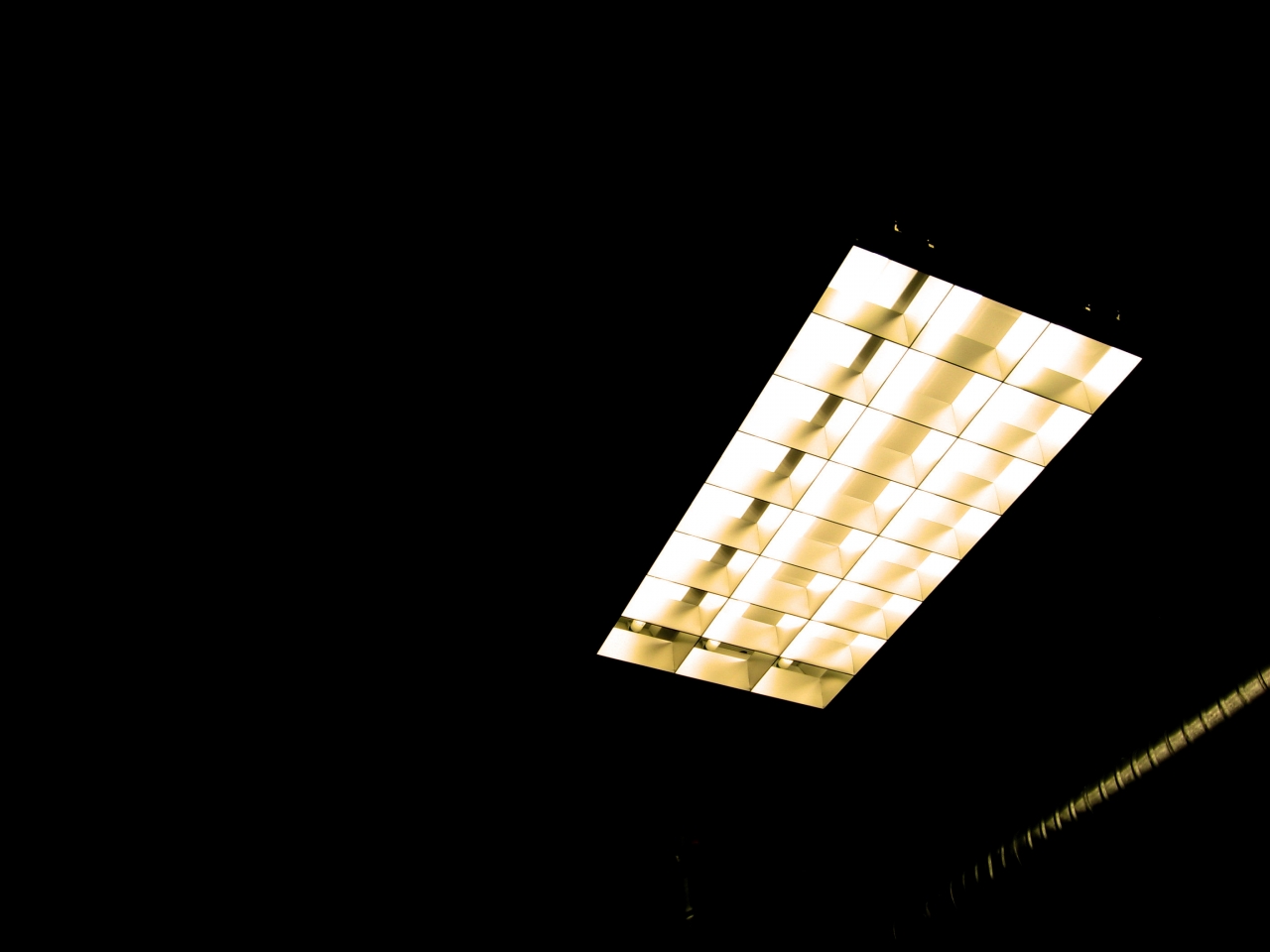 Overhead florescent lights in a laboratory.