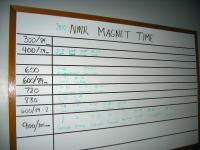 Nuclear Magnetic Resonance user schedule white board.