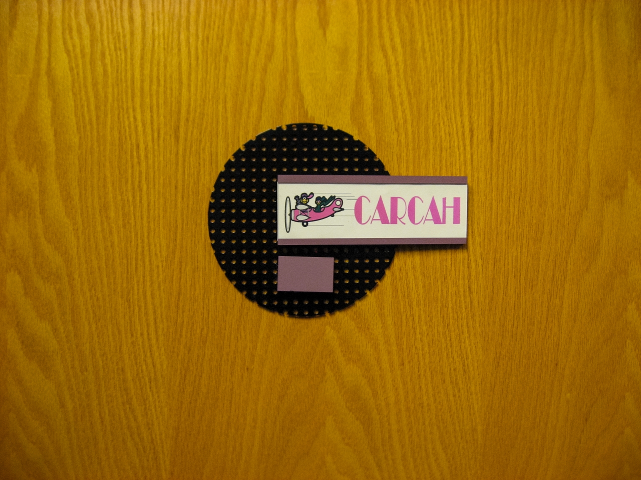 Sign on the office door of CARCAH, the Chief Aerial Reconnaissance Coordination All Hurricanes unit of the National Hurricane Center.