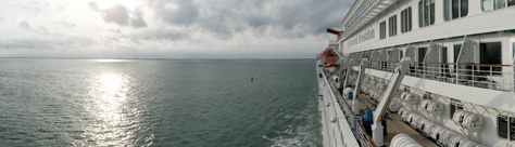 Photo Credit: David July — Panorama sailing away from Port Canaveral, seen from the Deck 11 forward lookout above the bridge on Carnival Sensation, Atlantic Ocean, off the coast of Cape Canaveral, Florida, 10 March 2011