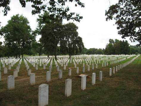 Photo Credit: David July — Rows and rows of white gravestones at Arlington National Cemetery (1864), Roosevelt Drive, Arlington, Virginia, 07 September 2009