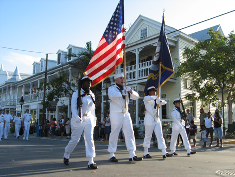 Photo Credit: David July — US Navy colorguard with flags in the Key West Veterans Day parade, Duval Street at Virginia Street, Key West, Florida, 11 November 2008